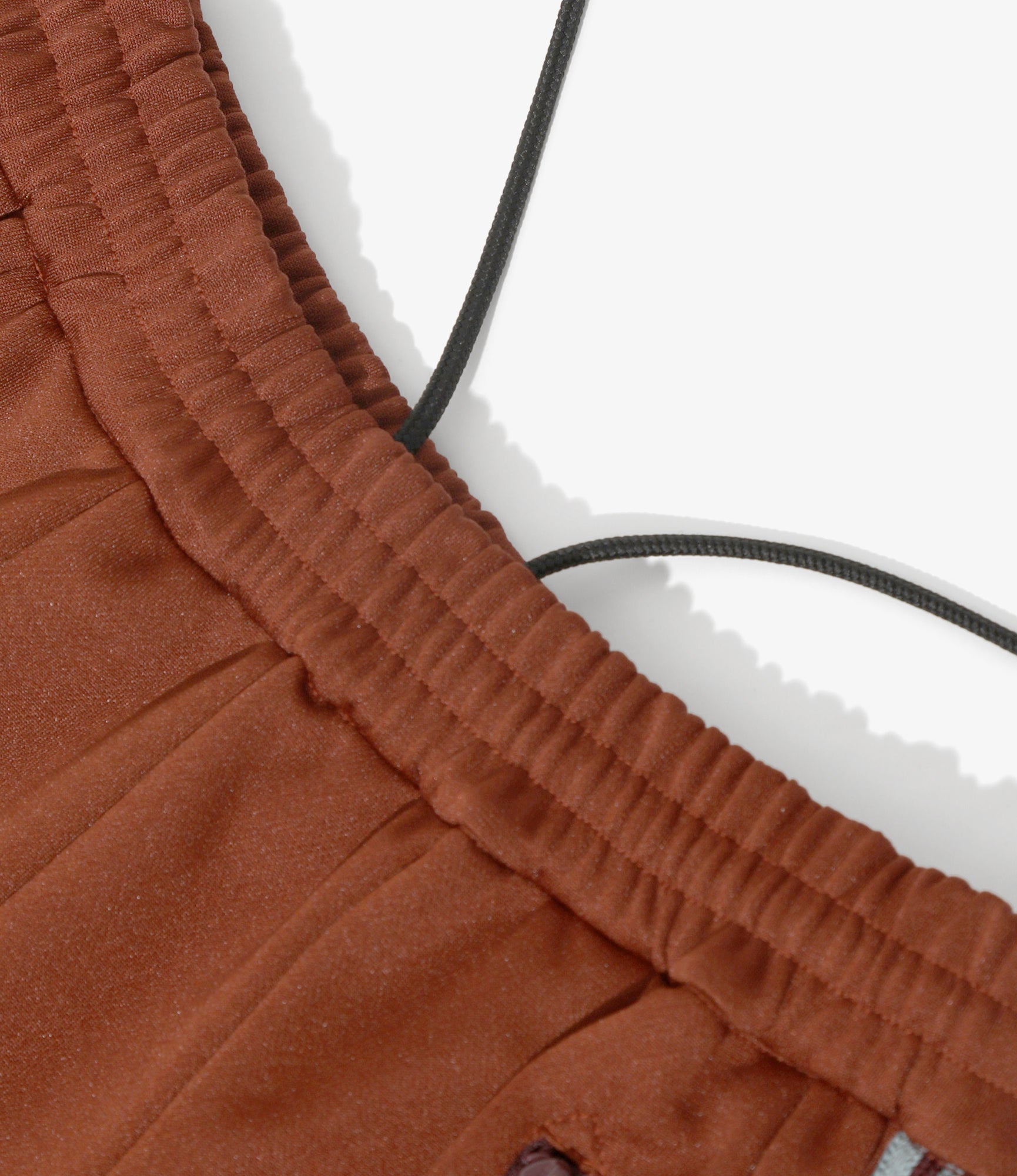 Pleated Track Skirt – Rust Smooth Polyester