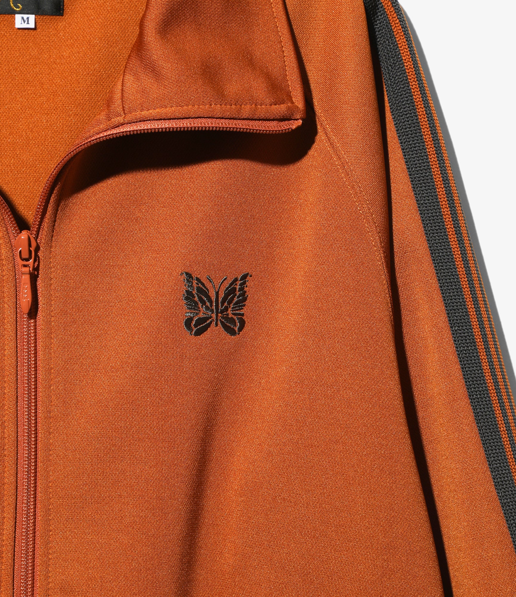 Needles Track Jacket - Poly Smooth - Rust – Needles – Nepenthes London